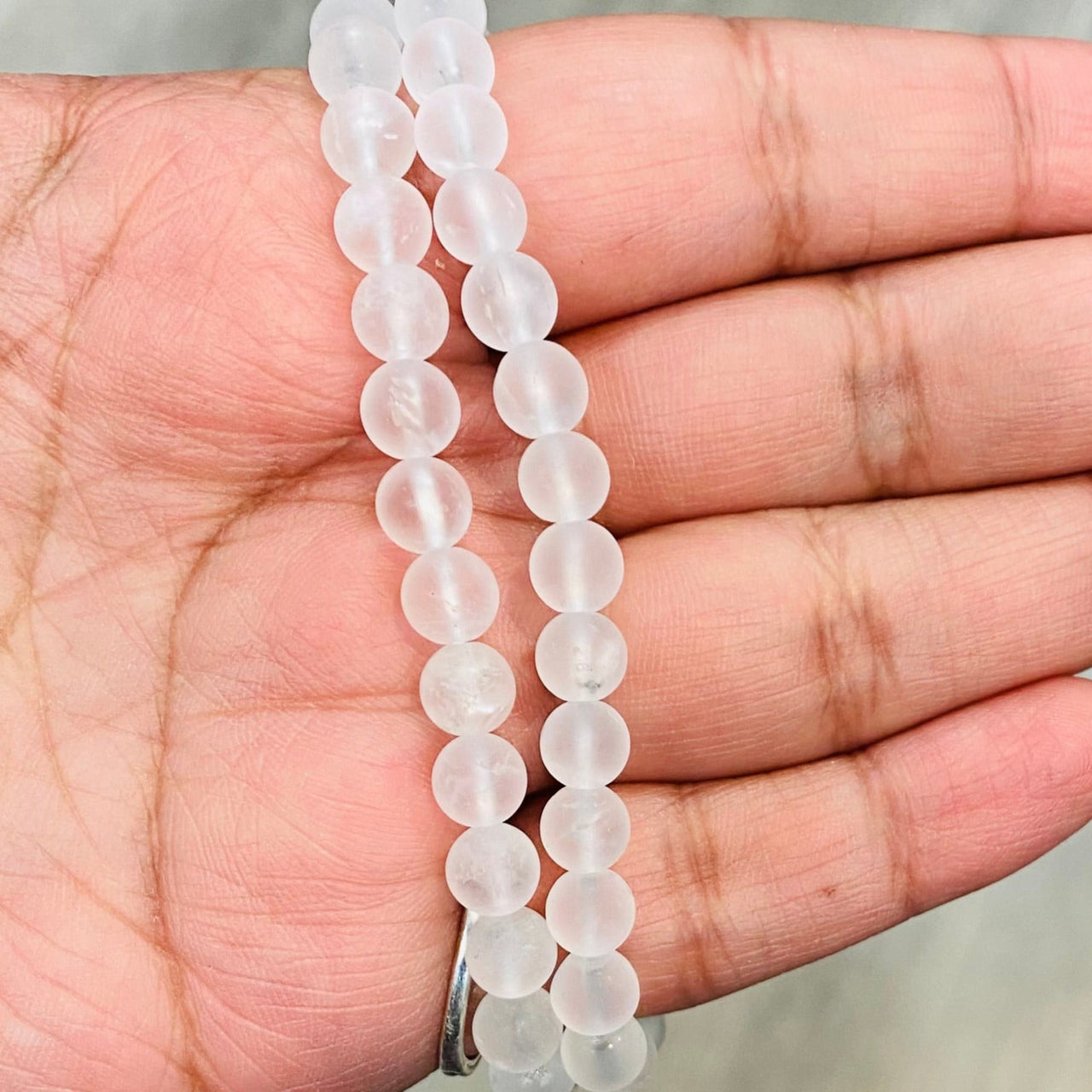 Frosted Bracelet #J586 featuring matte white glass beads enhancing reward notifications