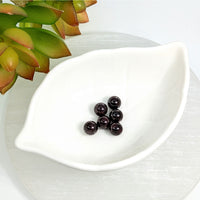 Thumbnail for White leaf-shaped ceramic dish with Garnet 7.5mm round beads for jewelry making