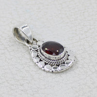 Garnet faceted oval with circle designs sterling silver pendant BC0409