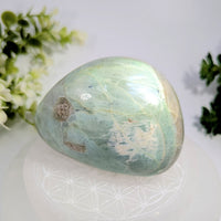 Garnierite 3.3 inch energy stone smooth translucent light green aventurine with subtle golden inclusions and polished surface