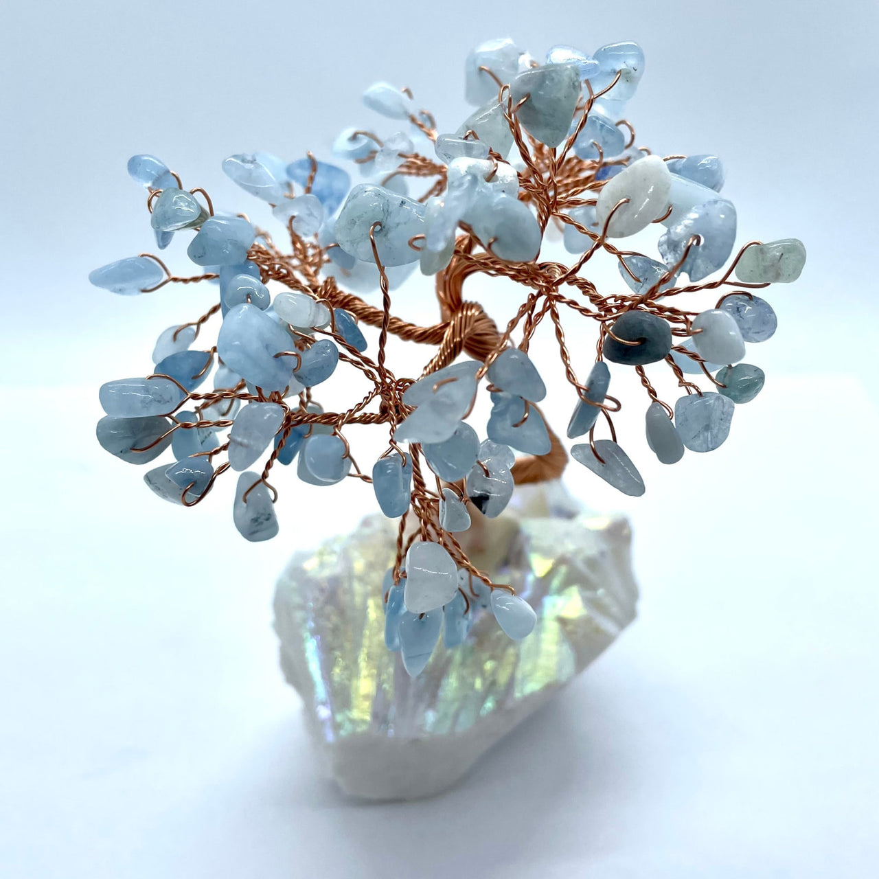 Delicate Gem Tree on Angel Aura Base featuring light blue gemstones and copper wire