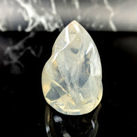 Girasol quartz 3.1 inch translucent teardrop flame crystal with natural internal striations and smooth polished surface