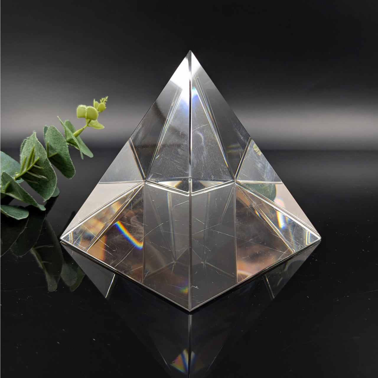 Clear crystal 9-inch pyramid with geometric facets and reflective surfaces, Glass 3.9’’ Pyramid #LV6062