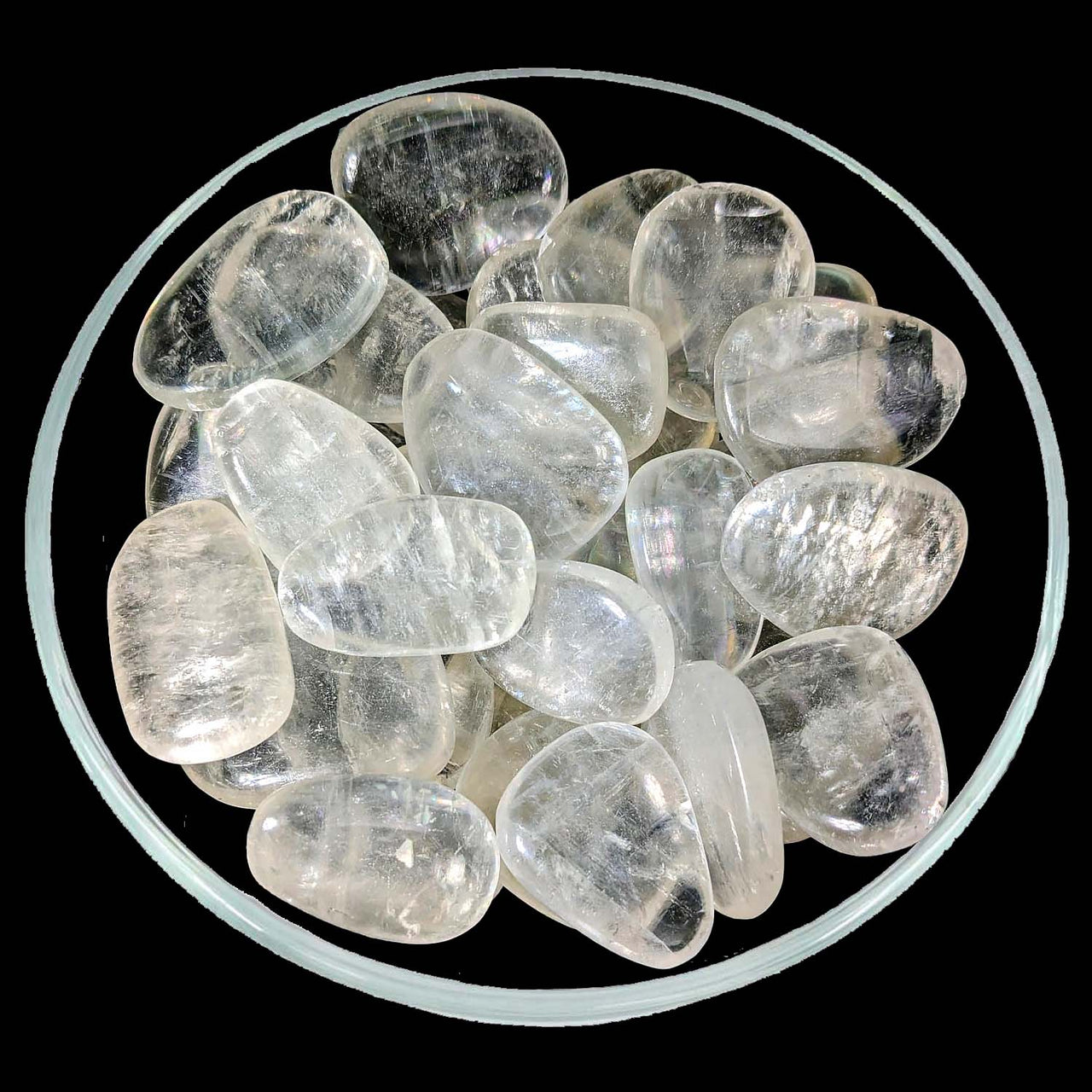 Ice cubes in a bowl next to a Gold Optical Calcite Palm Stone for decoration