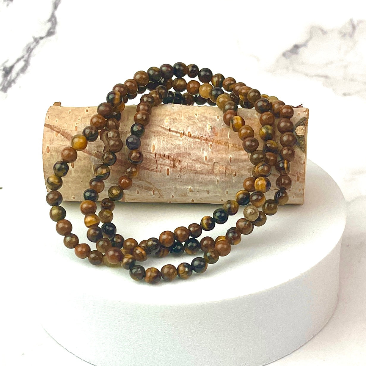 Gold Tiger’s Eye 4mm beaded bracelet with polished beads and natural streaks