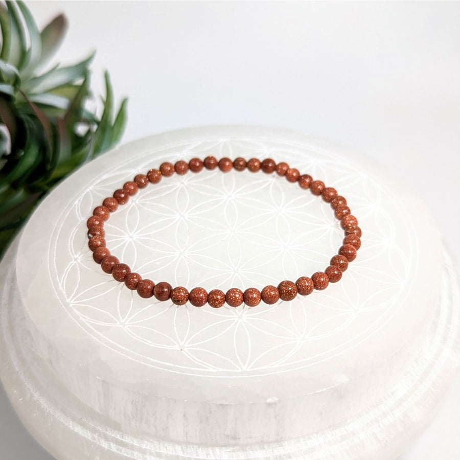 Goldstone beaded bracelet featuring 7-inch, 4mm beads in a stylish design
