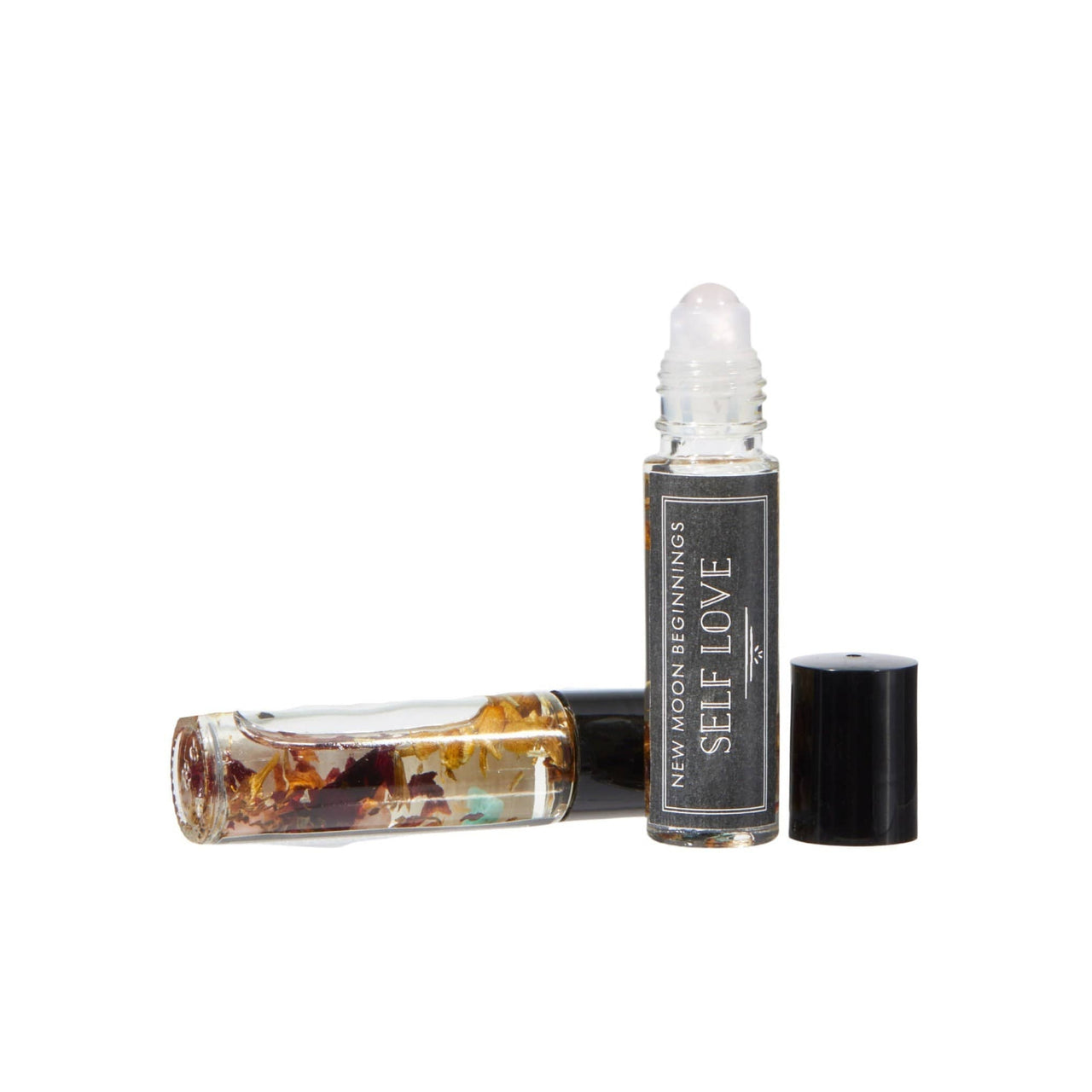 Good Luck: Intention Roll-on perfume with organic jojoba oil, black and white capped bottles