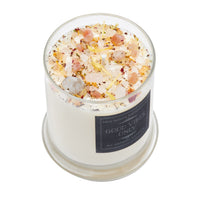 Good Vibes Only ritual soy candle in clear glass jar with pink yellow crystal salts and dried flower petals