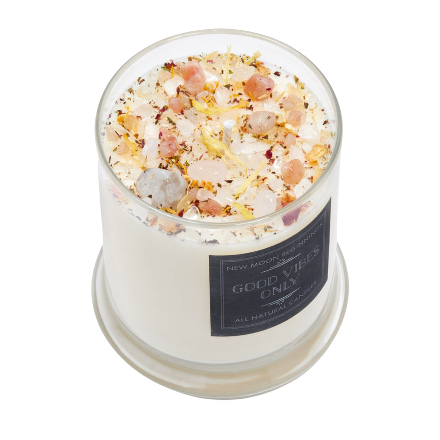 Good Vibes Only ritual soy candle in clear glass jar with pink yellow crystal salts and dried flower petals