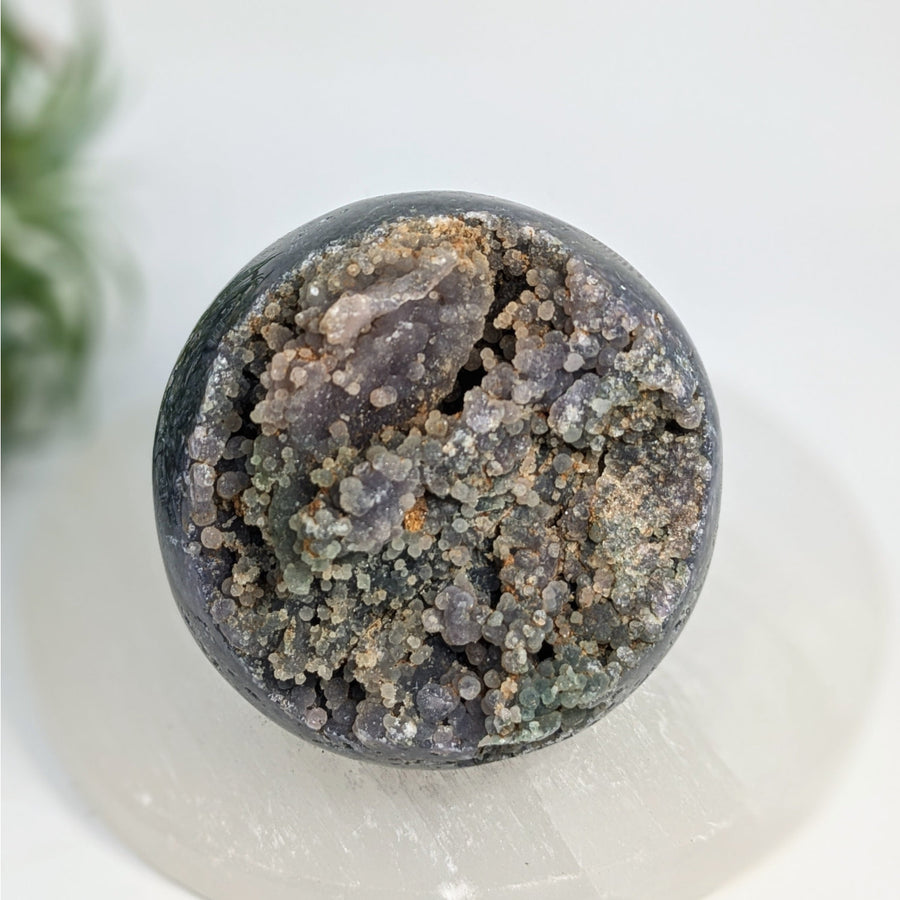 Round geode with purple chalcedony agate and gray crystals in Grape Agate 2.5’’ Sphere
