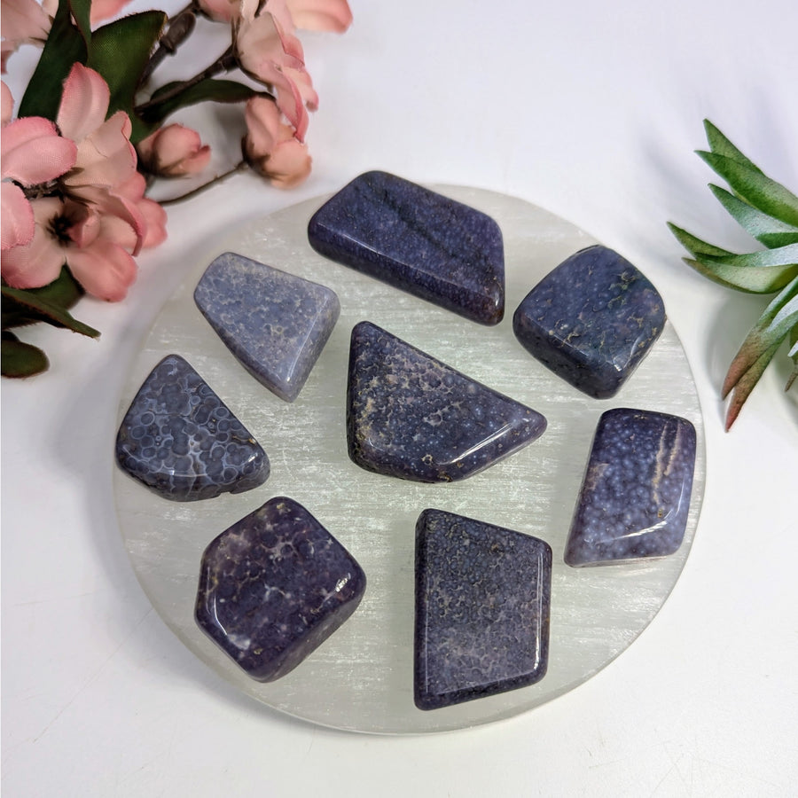 Polished dark blue Iolite gemstones from Grape Agate Tumbled Slice #LV7684