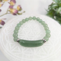 Green Aventurine 7.5 inch Bridge Bracelet featuring a green beaded design with cylindrical accent