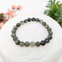 Green and gray beaded bracelet on display in the Green Sardonyx 7 inch Bracelet LV8455