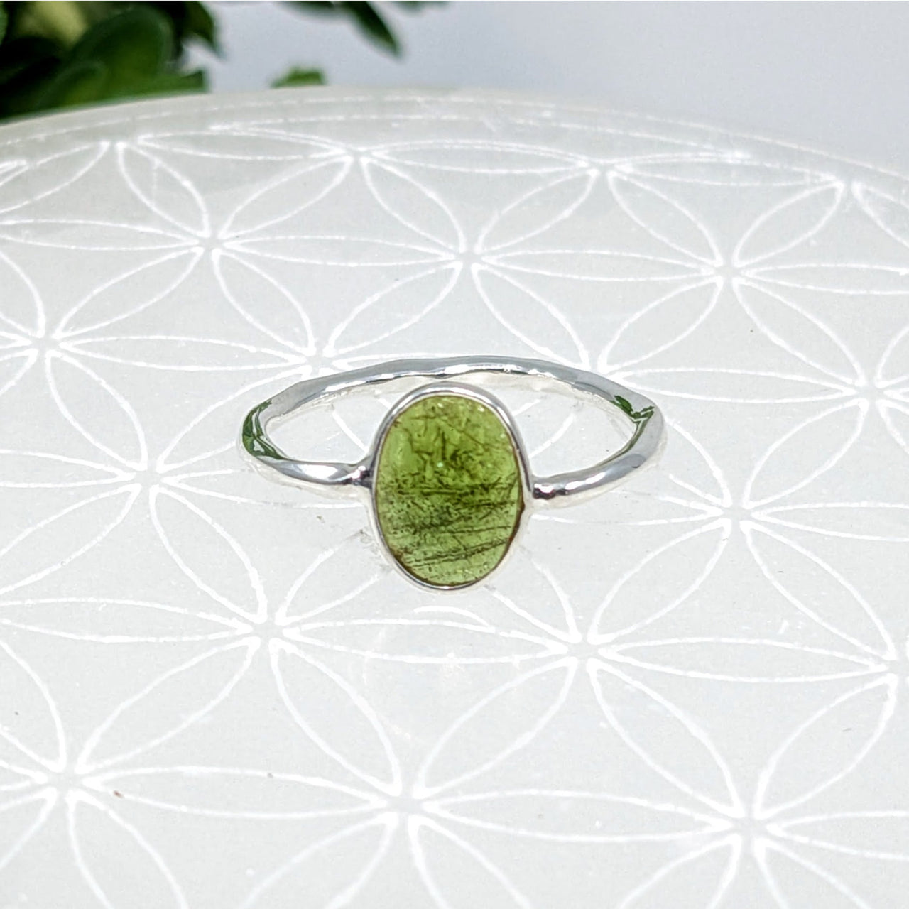 Sterling silver ring with oval peridot gemstone and green tourmaline accents, size 6