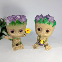 Two Groot crystal planters with amethyst hair displayed in the Groot Figurine 2.1 inch LV8672