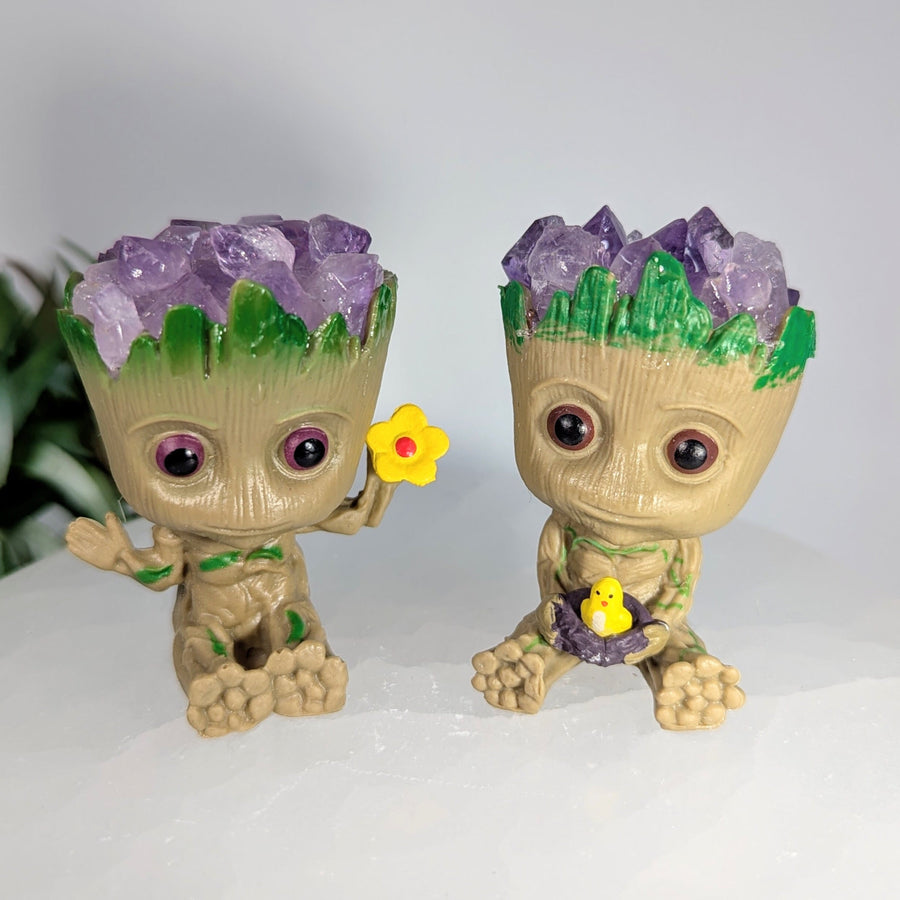 Two Groot crystal planters with amethyst hair displayed in the Groot Figurine 2.1 inch LV8672