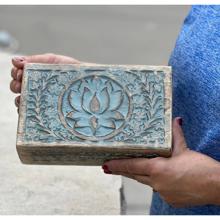 Carved wooden box with lotus design for elegant storage display