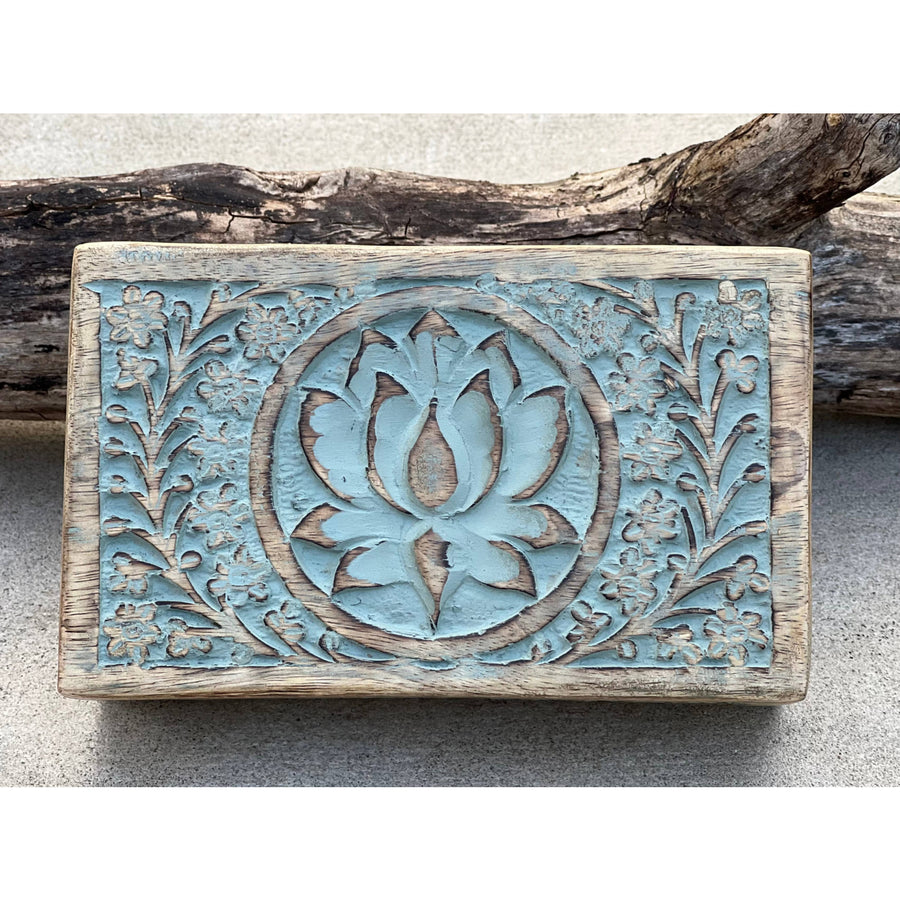 Rectangular carved wooden box with lotus flower design for elegant storage