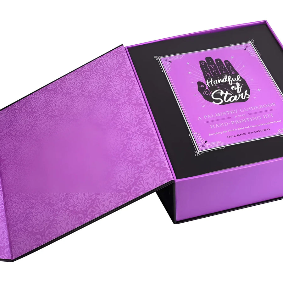 Purple box with black and white design for Handful of Stars: Palmistry Guidebook by Helene Saucedo