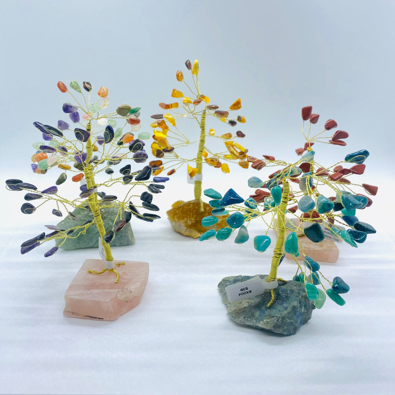 Handmade Gemstone Tree #X004 featuring three small glass trees with vibrant, colorful leaves