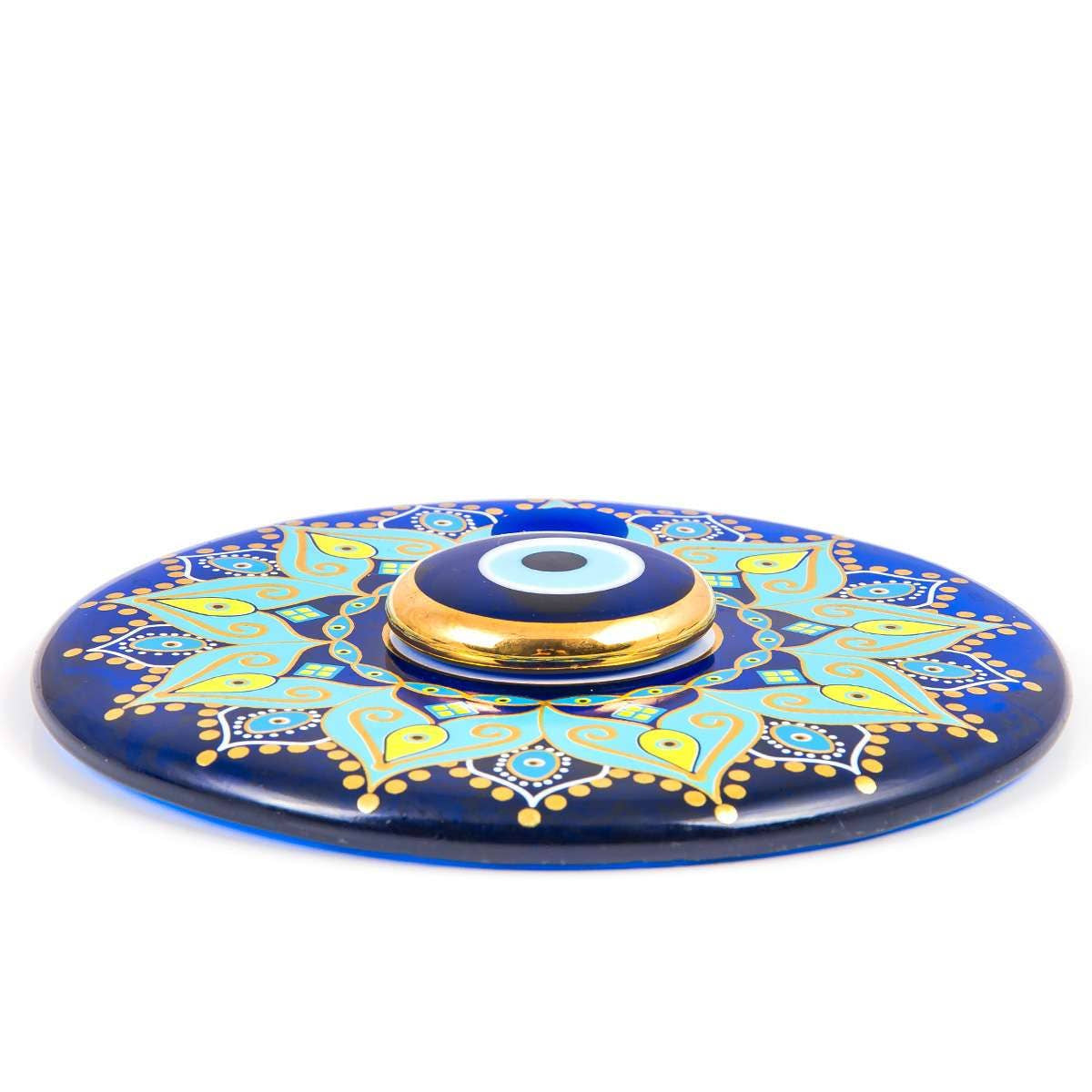 Decorative blue glass evil eye disk with turquoise and gold mandala for handmade gold evil eye wall