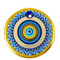 Thumbnail for Decorative circular medallion with blue and gold evil eye pattern in handmade gold evil eye wall hanging