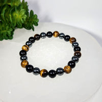 8-inch grounding bracelet with tiger’s eye, hematite, and black tourmaline beads