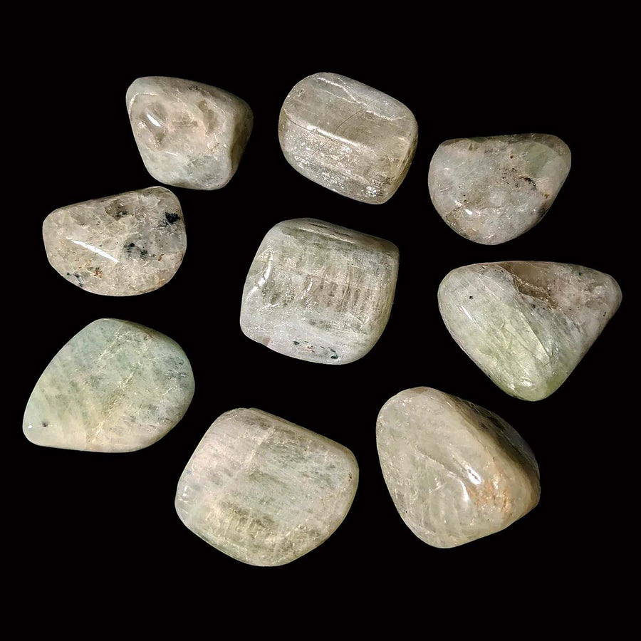 Group of green jade stones featuring Hiddenite AKA Green Kunzite Tumbled Stone LV1632