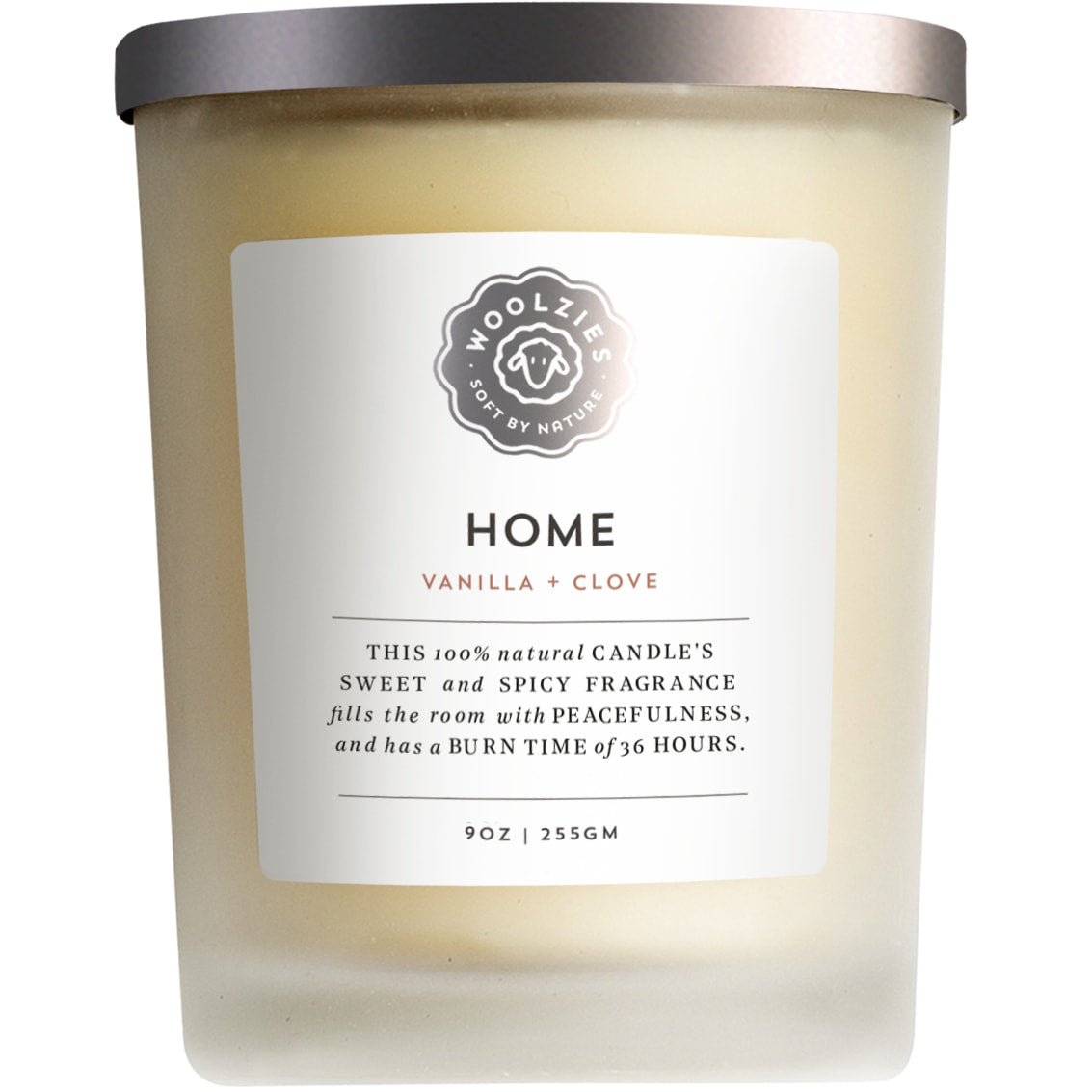 Frosted glass clove soy candle with shell mini chips and Home Vanilla + Clove label