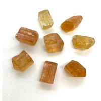 Thumbnail for Imperial Golden Topaz Small Rough #DV01 - close up of yellow and brown crystals