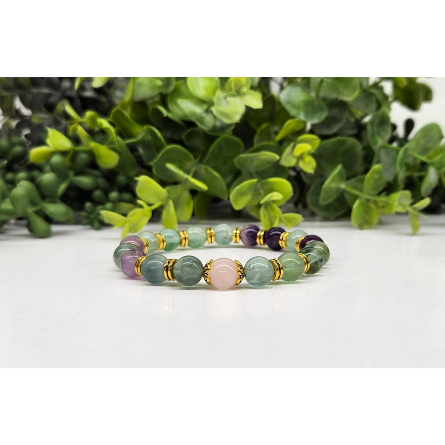 Handmade green aventurine bracelet with gold accents, amethyst, fluorite, rose quartz