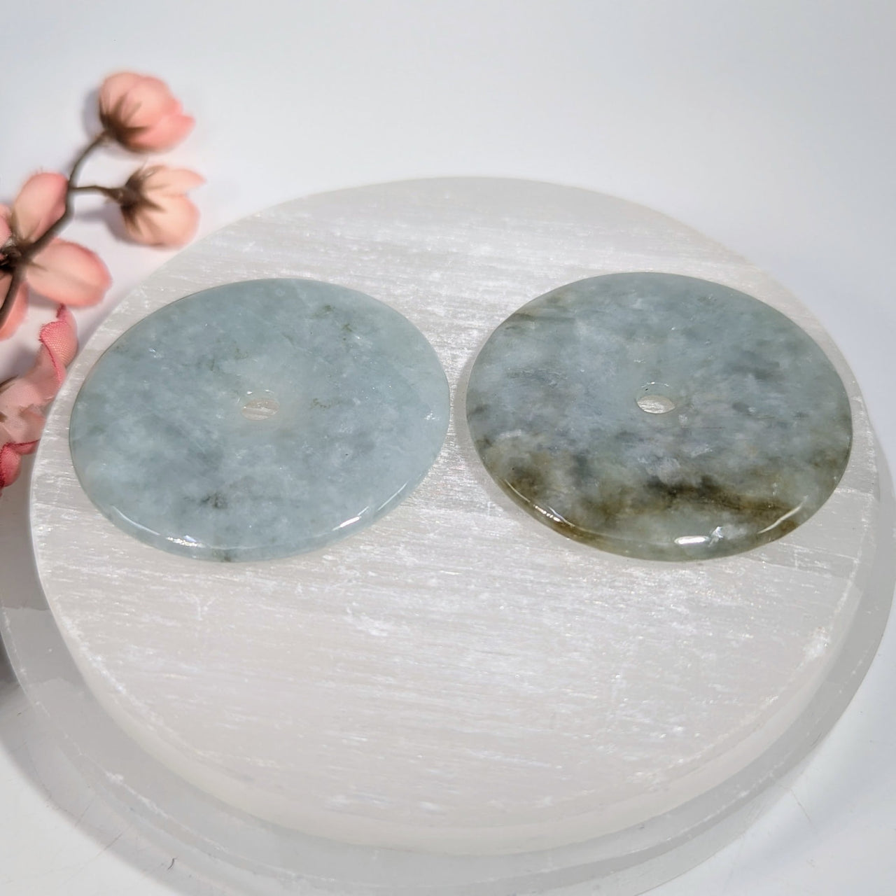 Two 2.1-inch jade donut pendants: light blue and greenish-gray veining, #BC0166