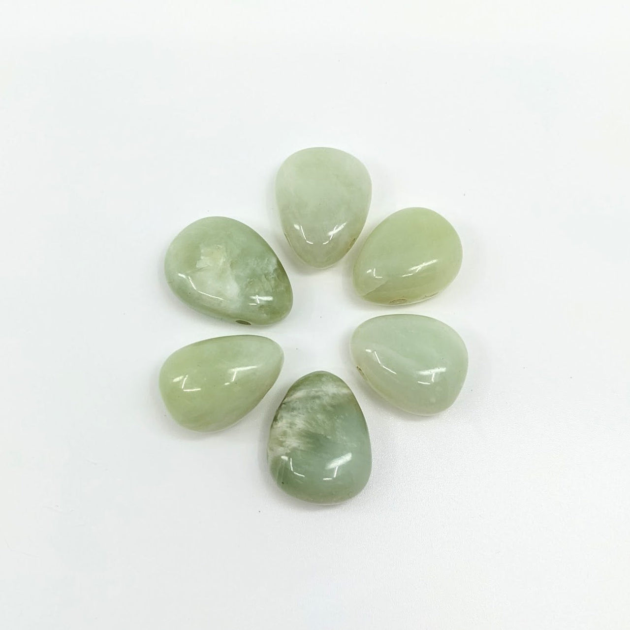 Green jade stones shown in the Jade Green Teardrop Pendant w/ Drilled Hole #LV1857