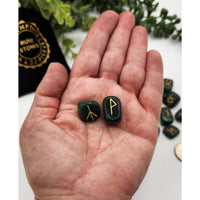 Green and black jade rune stone set with gold accents and velvet pouch LV9506