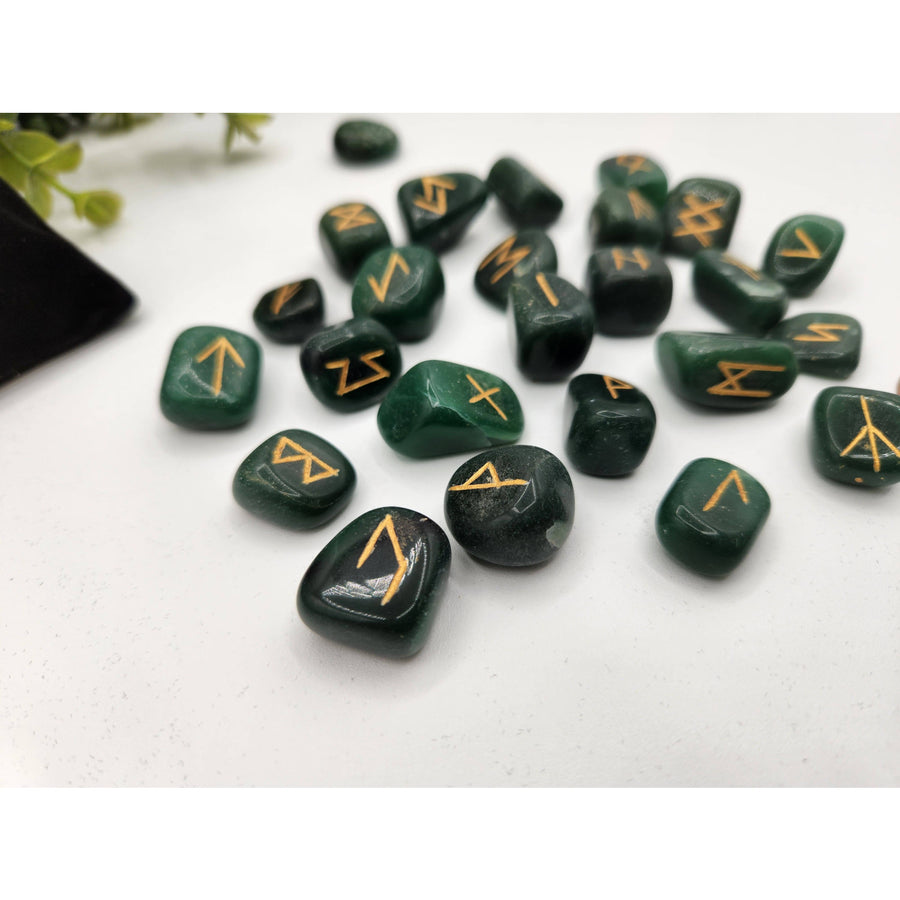 Jade rune set with green stones, gold markings, and velvet pouch LV9506