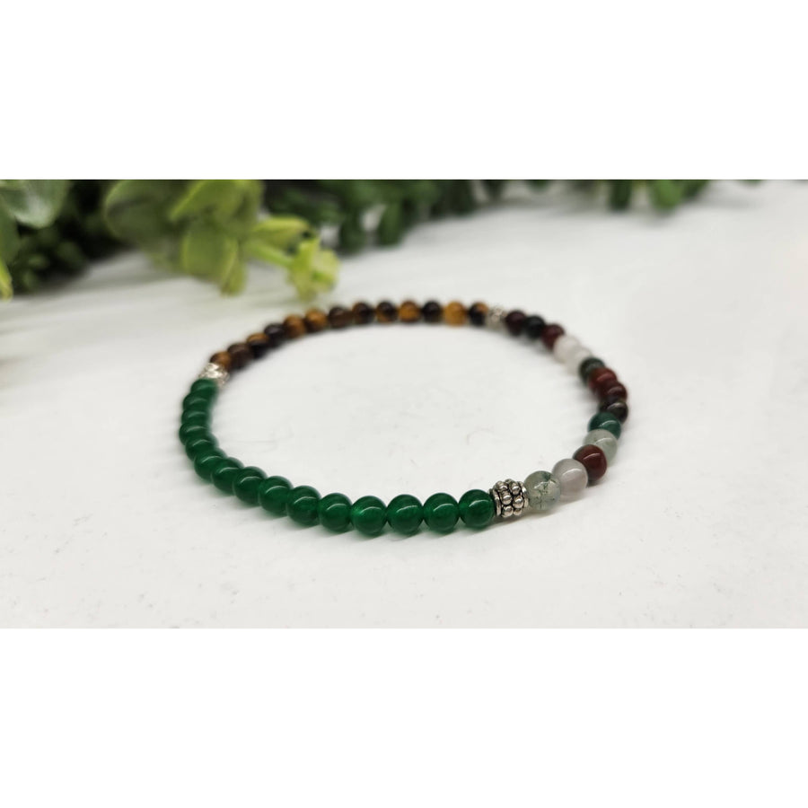 Colorful beaded bracelet featuring Jade, Tiger’s Eye, and Bloodstone for abundance