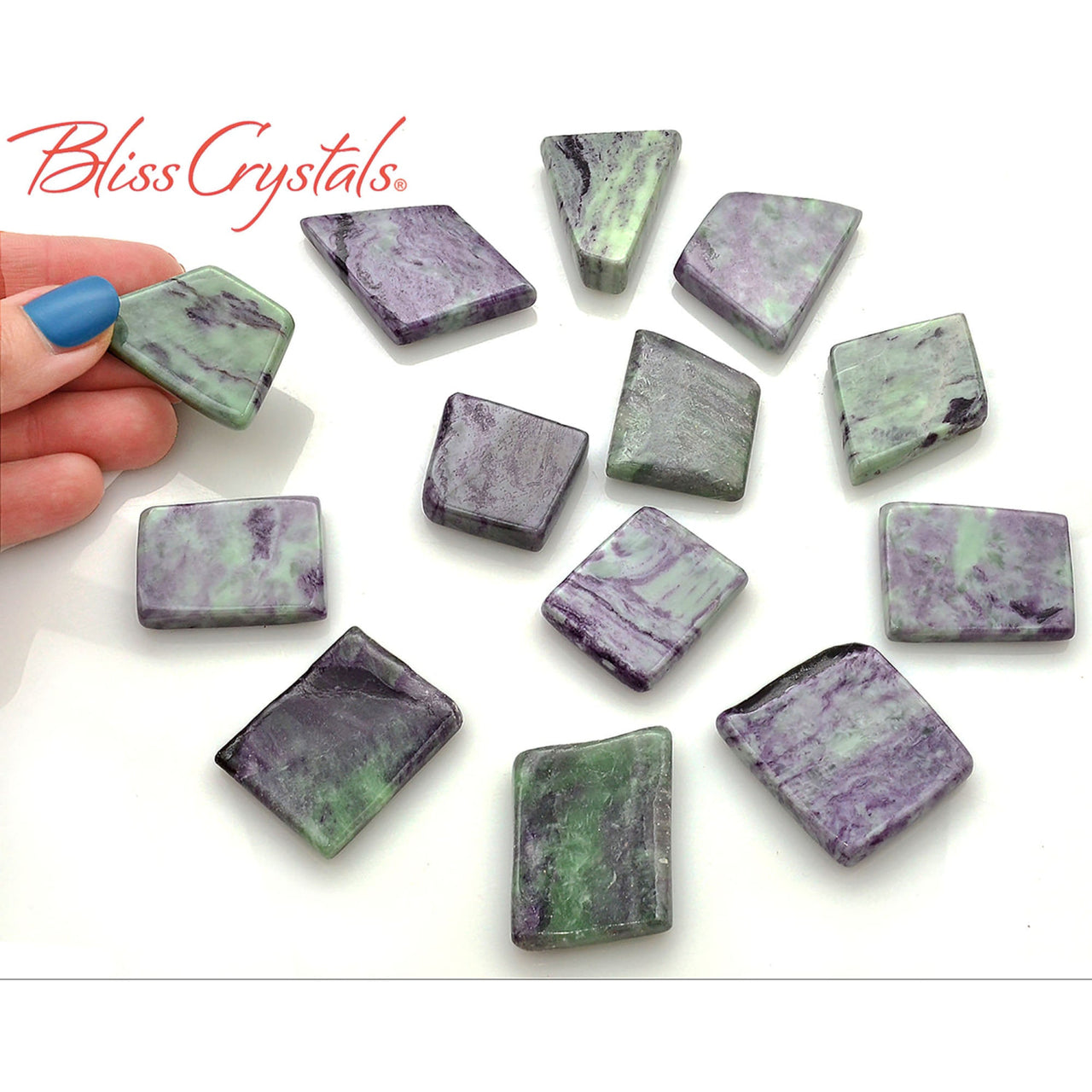 Kammererite slice and polished fluorite crystal slices in green and purple hues