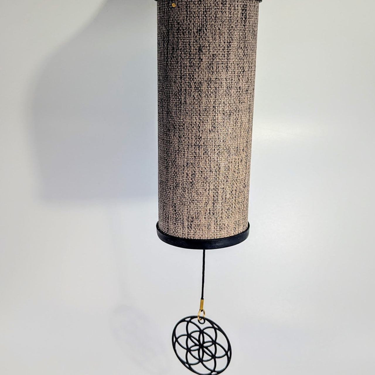 Koshi Chime 18-inch Ether BC1155 beige textured wind chime with black metal flower