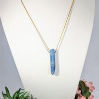 Blue Kyanite crystal pendant necklace on a gold plated chain, 18 inches long
