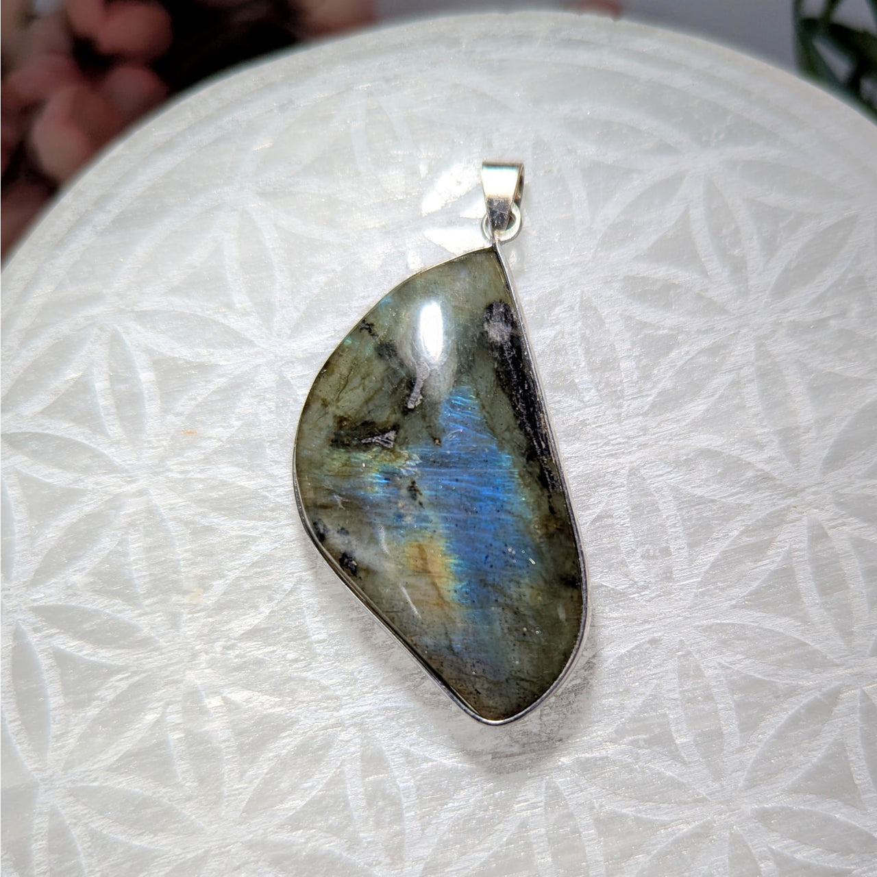 Iridescent Labradorite Pendant 1.7 inches displayed in Labradorite 1.7 Inch Pendant #LV8411
