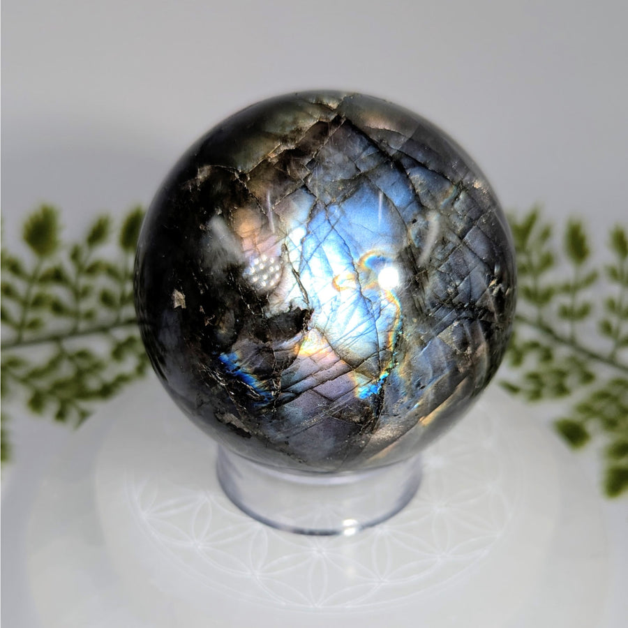 Polished 2.7-inch labradorite sphere #BC1241 with blue, purple, gold iridescence