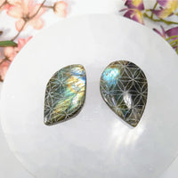 Labradorite cabochons with engraved Flower of Life patterns for jewelry making
