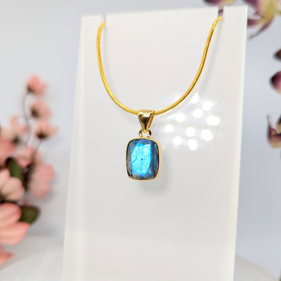 Gold chain necklace with blue Labradorite gemstone pendant in 18k gold plating