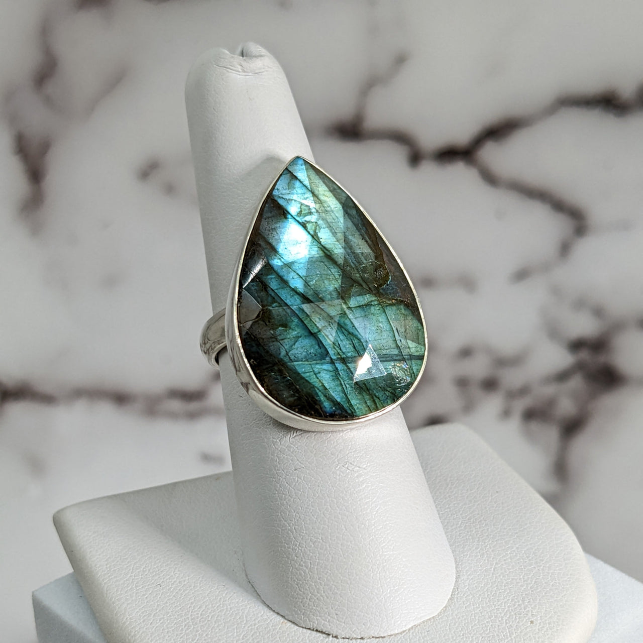 Close-up of Labradorite Faceted Sz 7.5 Teardrop SS Ring #SK9537 with shimmering stone