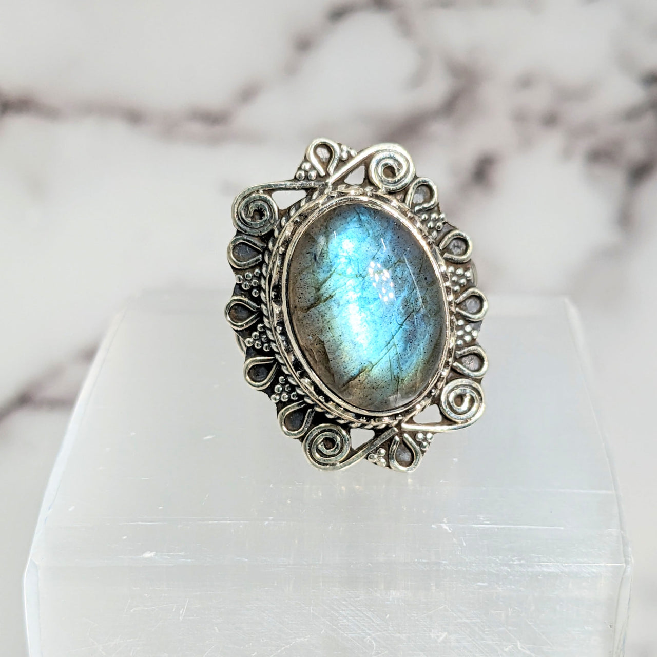 Close-up of Labradorite Sz 10 S.S. Oval Ring #LV2610 showcasing its shimmering labrador stone