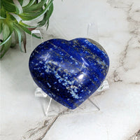 Thumbnail for Lapis Lazuli 1.8’ Heart #LV5241: Blue heart-shaped stone on a clear stand for display