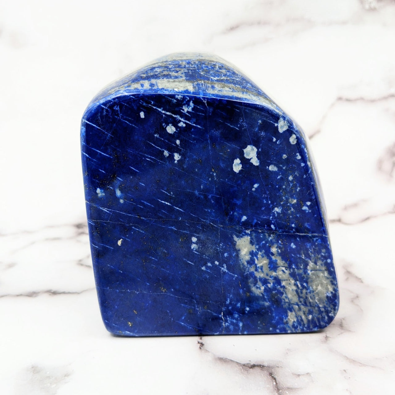 Lapis Lazuli 4’ Freeform #SK9724 blue marble block on a marble counter