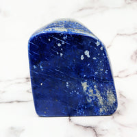 Thumbnail for Lapis Lazuli 4’ Freeform #SK9724 blue marble block on a marble counter