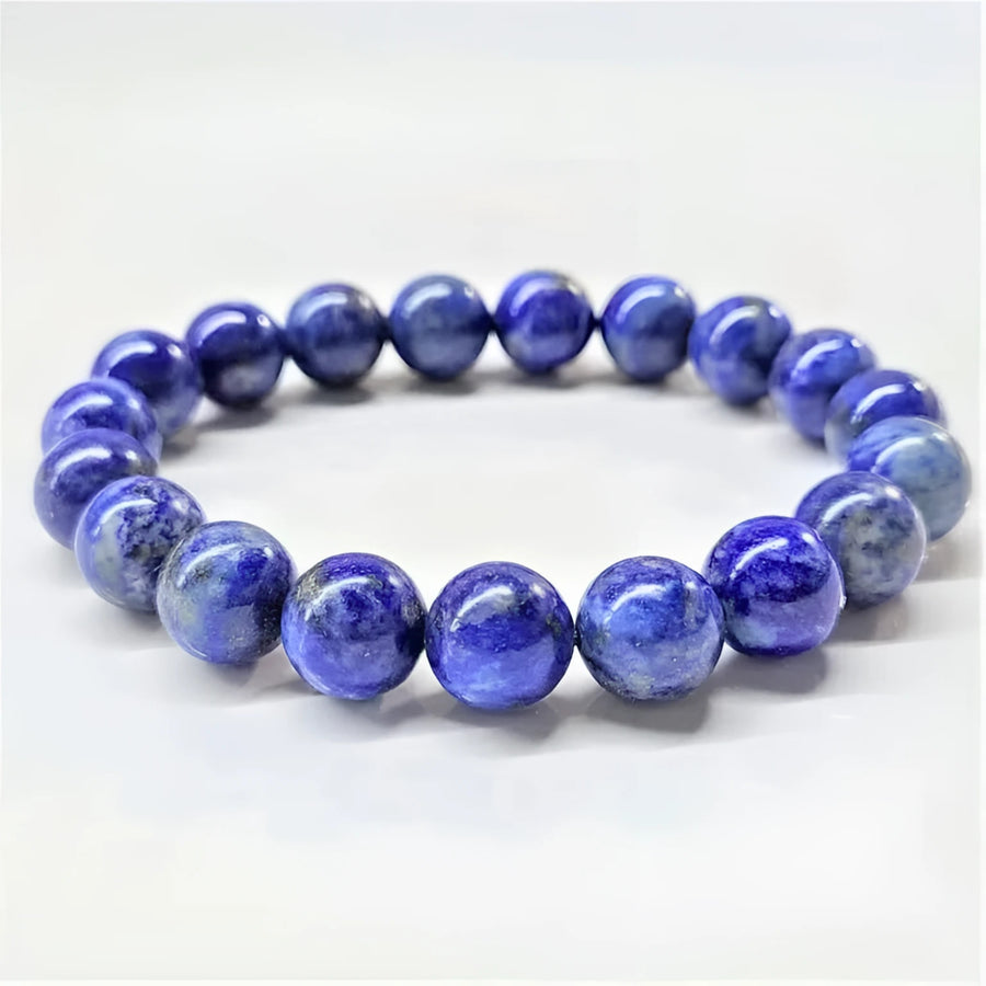 Lapis lazuli 8 inch 10mm beaded bracelet with smooth deep blue beads and subtle white and golden flecks