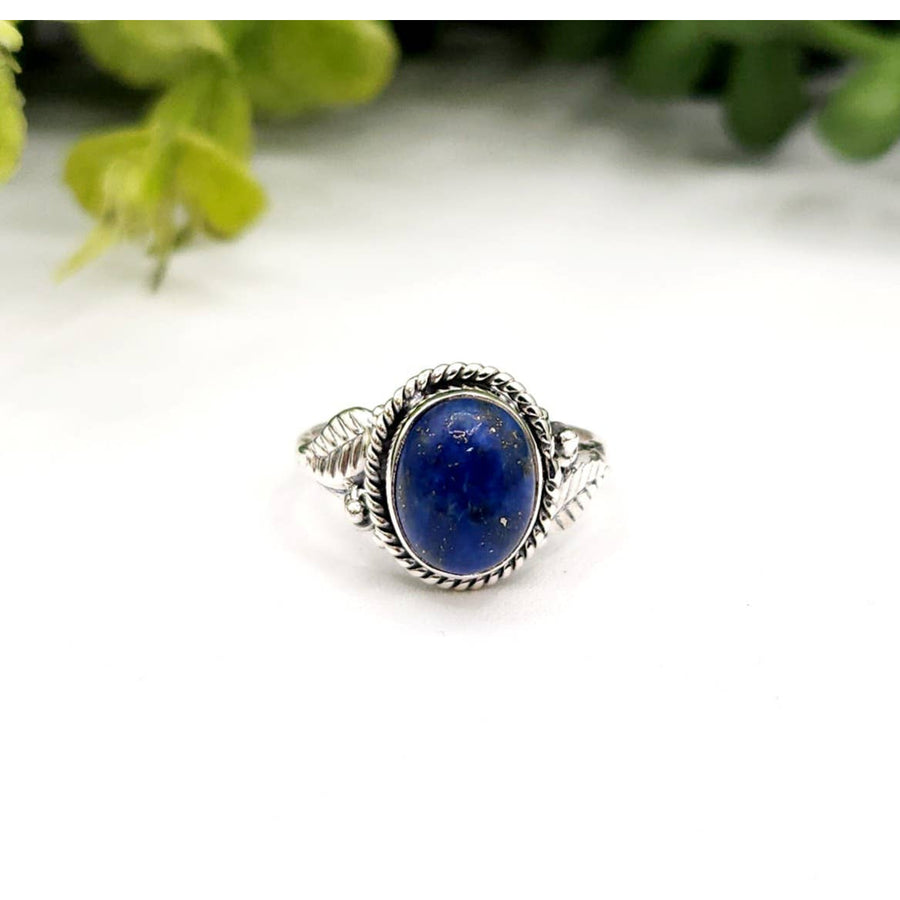 Silver ring featuring an oval Lapis Lazuli gemstone in a sterling silver setting